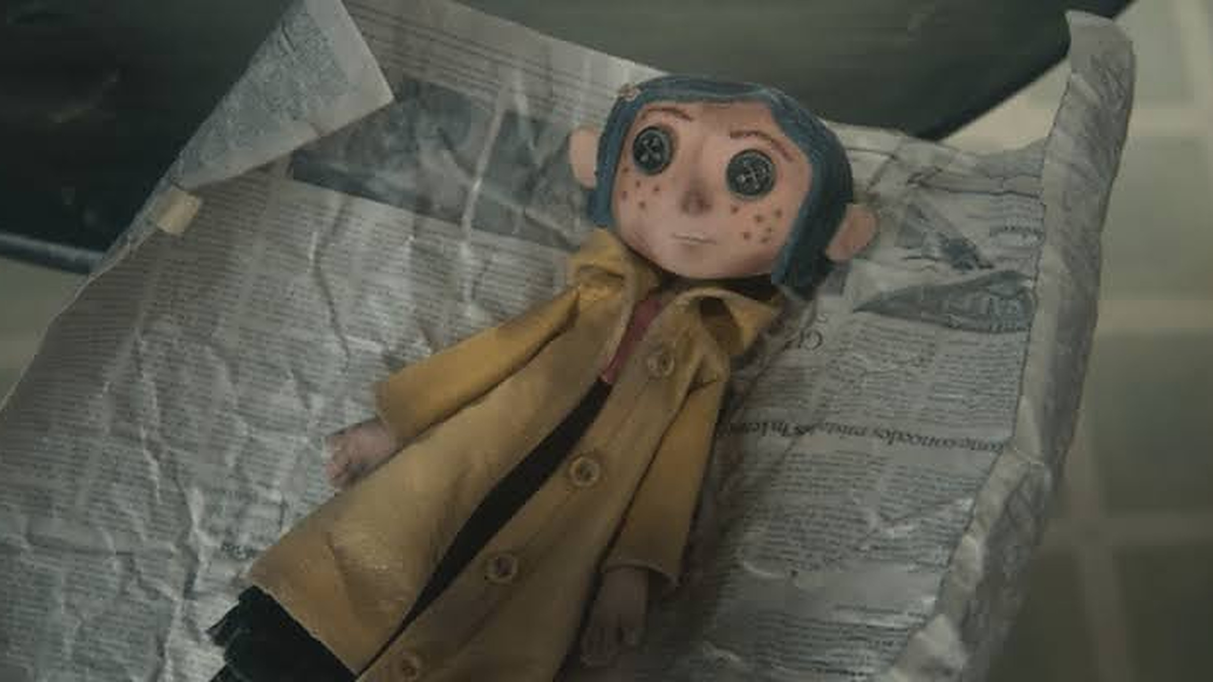 The button-eyed doll Wybie gives Coraline in Coraline