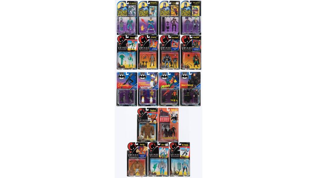 17 vintage Batman action figures i their original packaging.