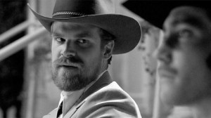 Before Stranger Things, David Harbour Showed Up In A Groundbreaking Western With A Dark Knight Star