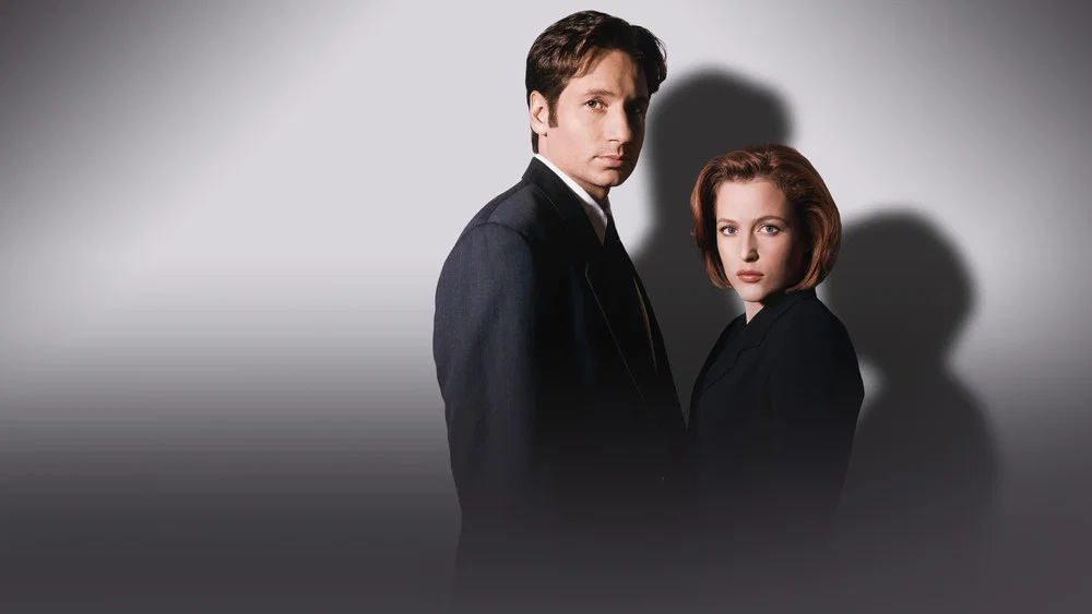 Mulder and Scully in a promotional photo for The X-Files