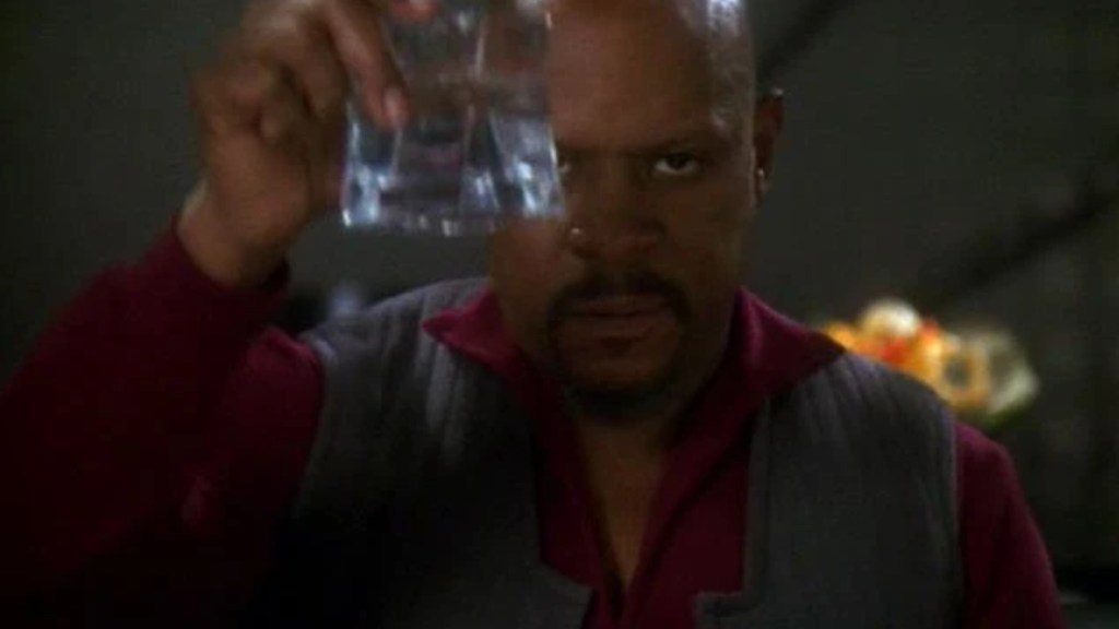 Captain Sisko raising a glass to doing what it takes to defeat the Dominion